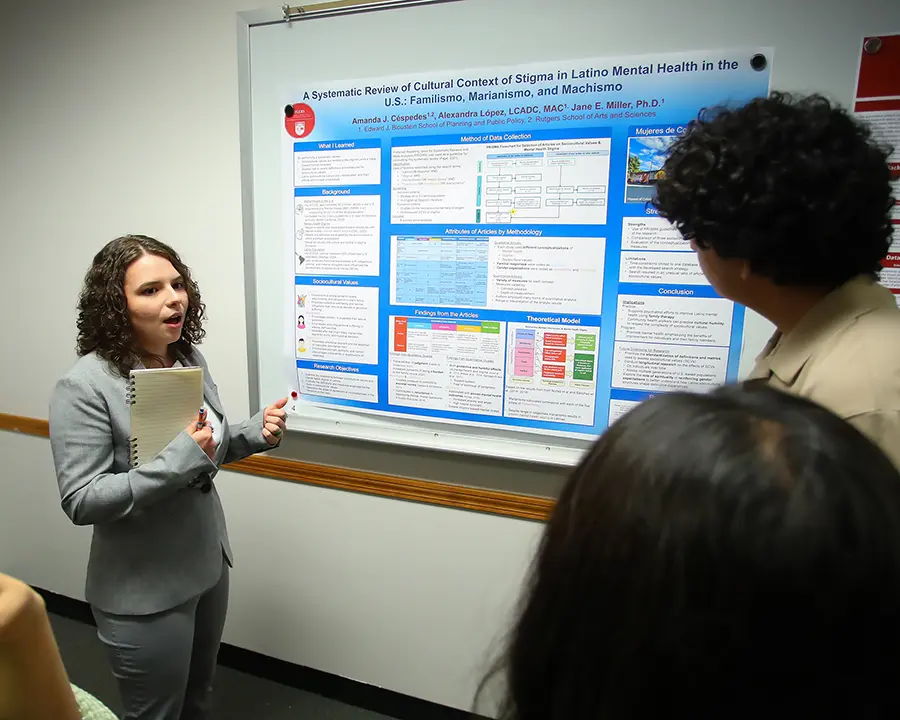 Amanda J Cespedes, public health undergraduate, presents her poster on Bloustein School Research Day, "A Systematic Review of the Cultural Context of Stigma: Familismo, Marianismo, and Machismo’s Influence on Latino Mental Health in the U.S." She was the winner of the best student poster.