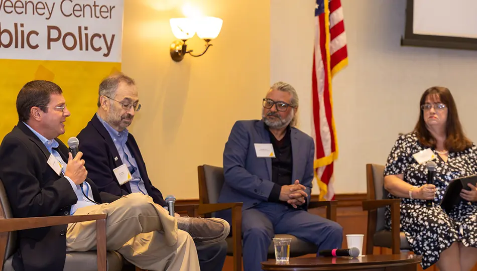 Discussing the future of journalism at a conference presented by the Sweeney Center for Public Policy at Rowan University are (from left) Michael Shapiro, founder and CEO of TapInto.net; Marc Pfeiffer, of the Bloustein Local Government Research Center at Rutgers University; Enrique Lavin, editor of online newspapers at NJ Advance Media and The Star-Ledger; and moderator Kathryn Quigley, chair of journalism Rowan's journalism department, which co-sponsored the conference.